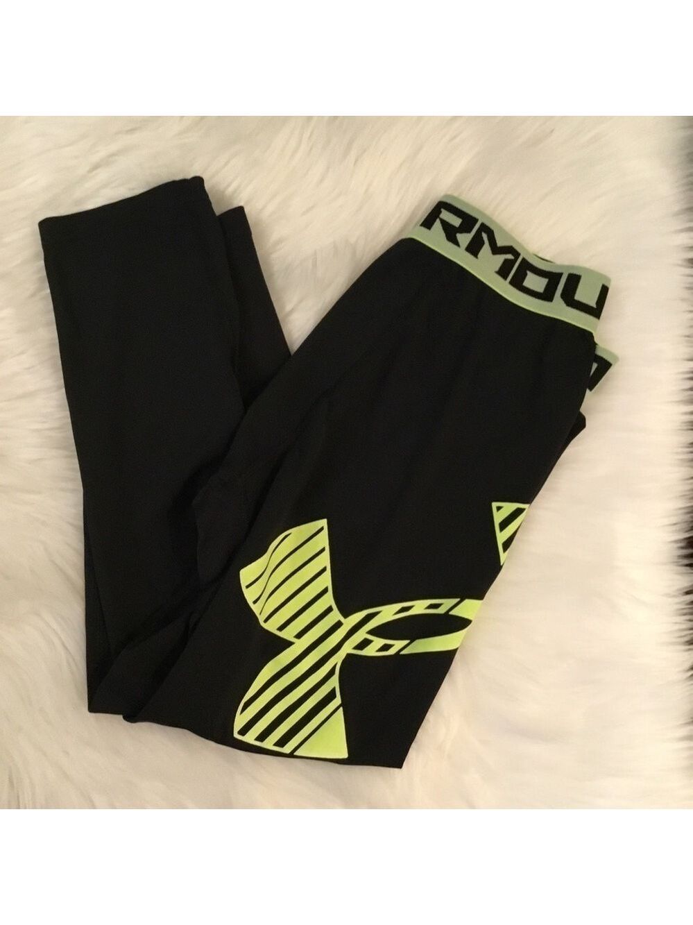 Under Armour youth large black with bright yellow fitted heat gear
